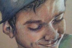 Joven con gorra, 25 x 30. Pastel sobre papel, 2014 -Young man with cap, 25 x 30. Pastels  on paper, 2014